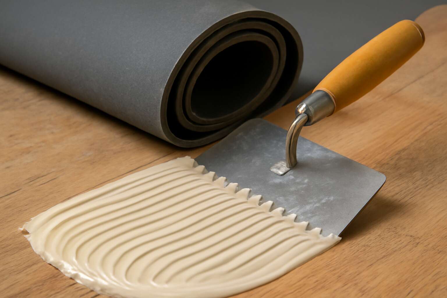 rubber floor adhesive to wood